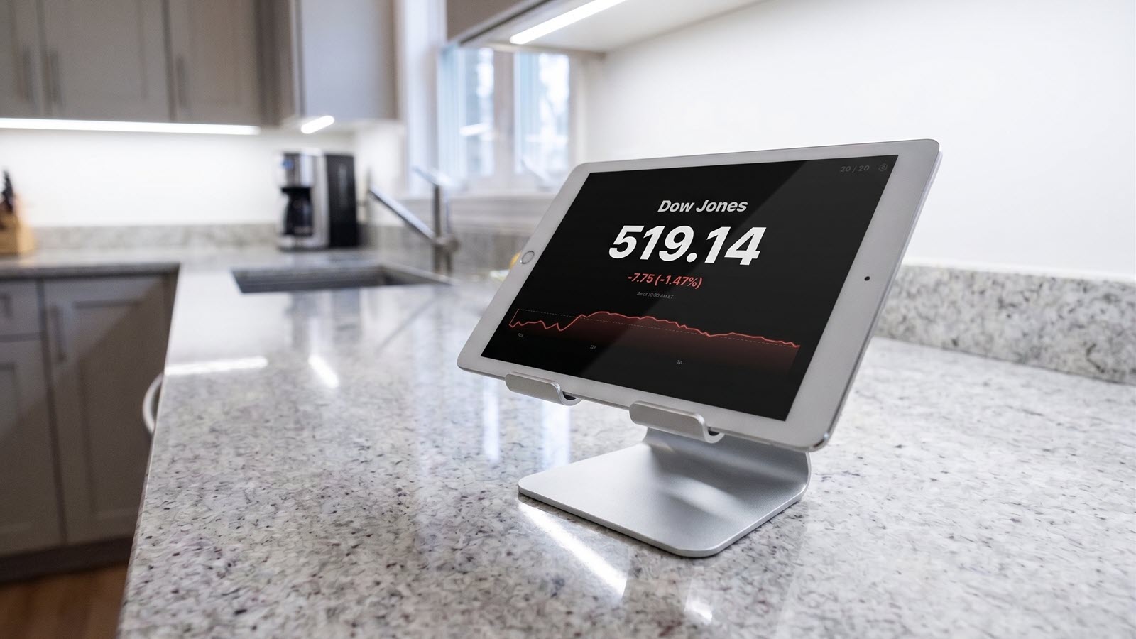 TickrDash sports ticker running on a tablet propped on a kitchen counter